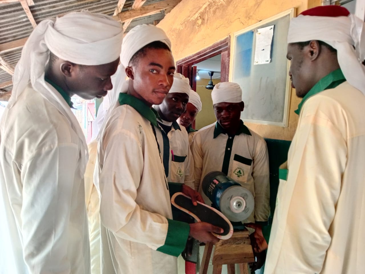 Students learning shoe making at Marcaz Shuban Academy